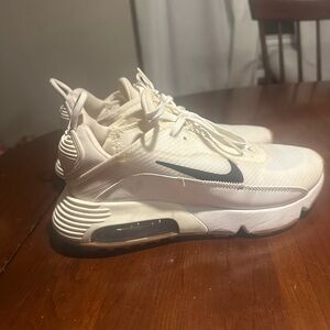 Nikes cream with tan and black details